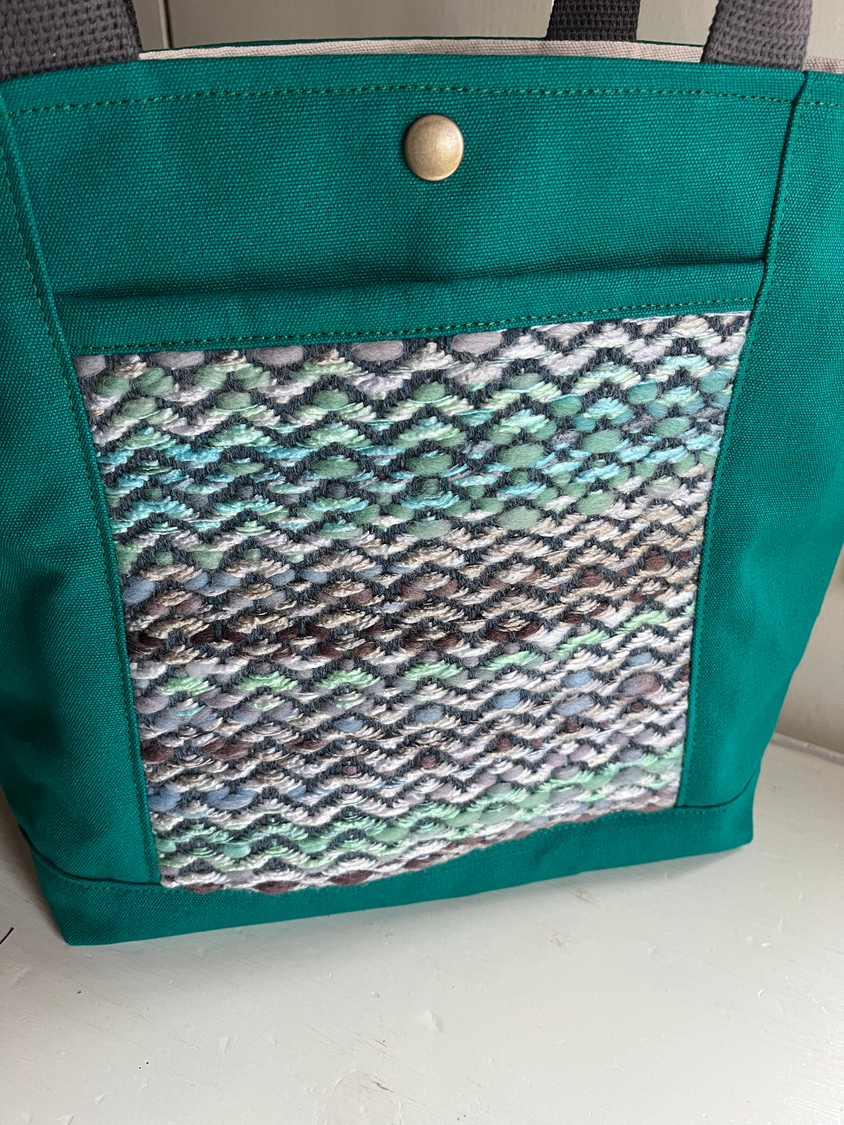 Bent Snap Tote 135 - blue green textile / teal canvas